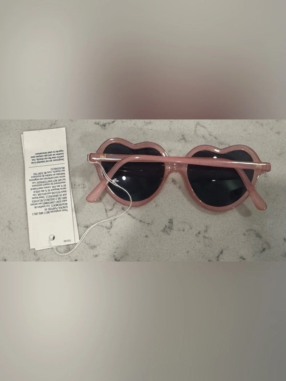 Heart-Shaped Pink Sunglasses with Dark Lenses